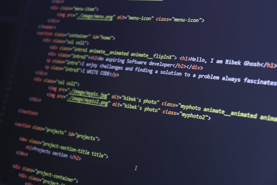 A close-up view of a laptop screen displaying lines of HTML and CSS code on a text editor, with a large, orange calculator interface overlaid on the right side of the screen. The workspace is set on a